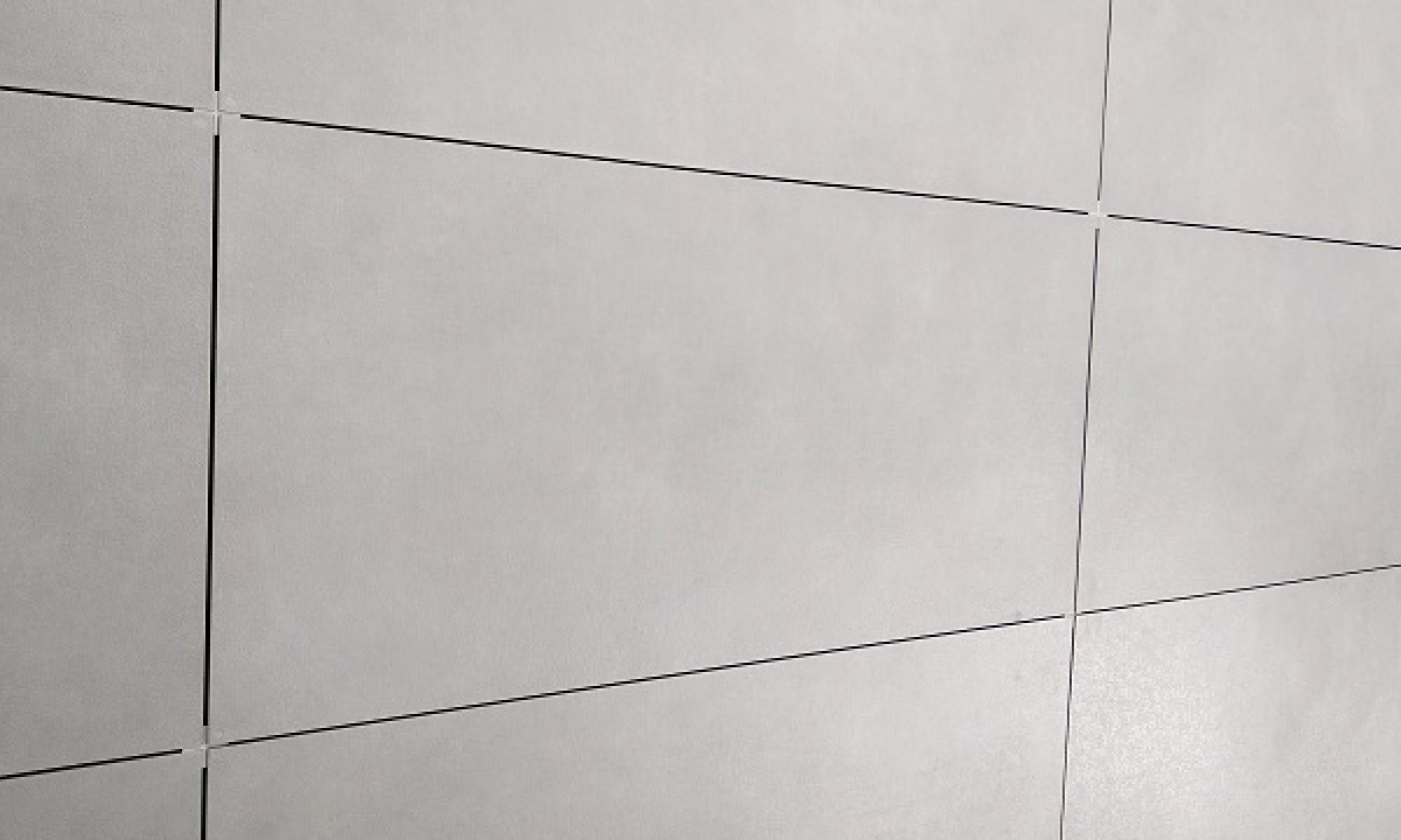 Wall ceramic tiles installation on mortar glue.